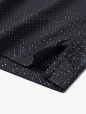 Detail of side slit hem on BLACK 4 Way Stretch Jacquard Polo — clean stitching and stretch finish
