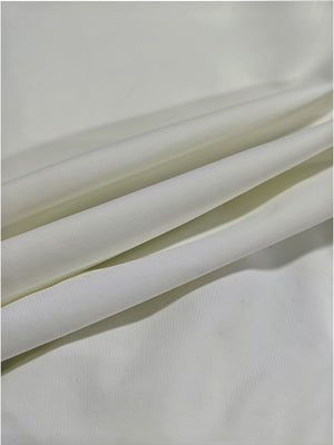 Close-up texture of silver grey women's regular fit stretchy golf pants fabric showing detailed stretchy material and weave.
