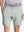 Front view of youth wearing glacier grey Heather Performance Golf Shorts, showing fit and style