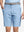 Front waist to knee view of light blue water resistant golf 9 inch shorts, clean athletic fit.