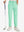 Boys Stretch Fleece Lined Casual Golf Pants in turquoise, front lower body view with golf club
