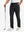Soft lightweight casual golf pants with 5 pockets in black, front lower-body view with relaxed fit.