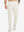 Model wearing Water Resistant Comfy Fleece Golf Joggers in cream, lower body front view