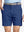 Front waist to knee view of cobalt water resistant golf 7 inch shorts, clean athletic fit.
