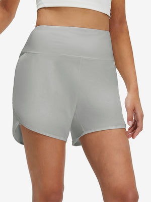 Pantalones cortos de secado rápido 2 en 1 de talle alto para mujer con 7 bolsillos