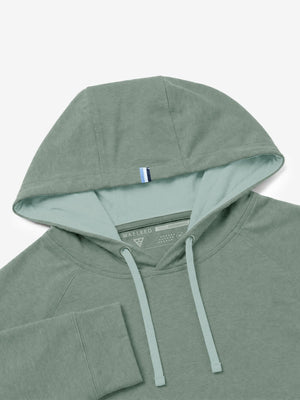 Close-up detail of hood structure, heather midlayer golf hoodies in celadon green heather