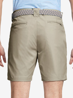 Back waist to knee view of khaki water resistant golf 7 inch shorts, flexible performance fit.
