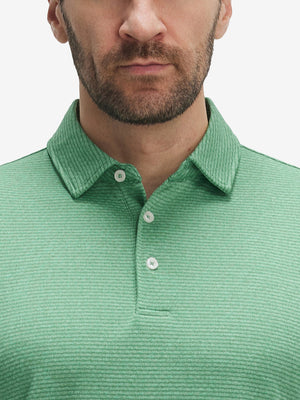 Front view from nose to chest of model wearing light green ultra-light quick dry moisture wicking collared polo shirt