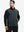 Model wearing water-resistant fleece golf vests, hand in side pocket, relaxed fit in dark grey