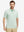 Front half-body view of a model wearing the emerald feather weight jacquard polo shirts, showing the chest pocket