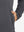 Close-up of pocket detail on midweight warm stretchy quarter zip pullover in grey, showing neat stitching.