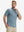 Front waist-up shot of model wearing blue flower breathable jacquard pattern 3-button golf polo