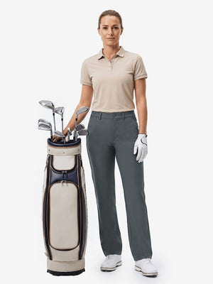 Front full body shot of model with golf gear wearing dark gray women's regular fit stretchy golf pants