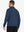 Back half-body view of model in COBALT HEATHER Quarter Zip Melange Pullover highlighting smooth fit.