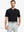 Front half-body view holding a golf club in Everyday Collarless Jersey Shirt in Black.