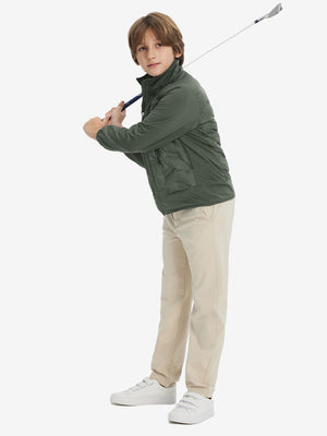 Model holding a racket, wearing army green boys windproof puffer jacket with pockets in full-body view.