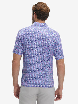 Back waist-up shot of model wearing pink purple flower performance quick dry print golf polos