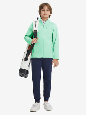 Full-body view of model wearing kids soft lightweight fleece lined jacket in turquoise, displaying the jacket's fit and design.