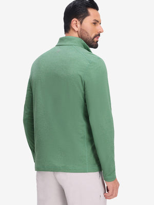 Back upper body shot of model wearing light green featherweight midlayer quarter zip pullover