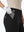 Detail view of front pocket on black women's regular fit stretchy golf pants