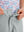 Detail: waistband of rose dust boys lightweight dry fit flat front golf shorts