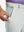 Hand placing a golf ball into pocket of water-resistant golf stretch nylon pants in glacier grey.