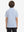 Back upper body view of youth performance golf polos, showing shape and smooth white/light blue finish