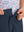 Detail: waistband of navy boys lightweight dry fit flat front golf shorts