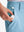 Detail: pocket of sky blue boys lightweight dry fit flat front golf shorts