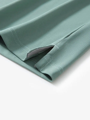 Detail shot of hem opening on BERYL GREEN Ventilated Pique Performance Polo