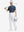 Full front: model in dark blue plant stretch printed collarless henley golf shirts holding golf club.