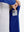 Close-up of the front side pocket detail on kids soft lightweight fleece lined jacket in klein blue, showing quality stitching.