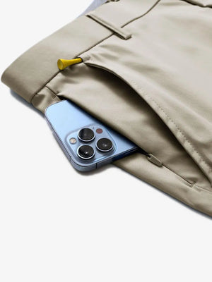 Pocket detail showing iPhone – MAELREG Khaki shorts, 9 Inch