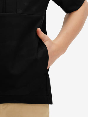 Detail shot of pocket on black water-resistant short sleeve q-zip hoodie for boys