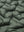 Fabric close-up showing the material of army green boys full-zip fleece-lined puffer vest.