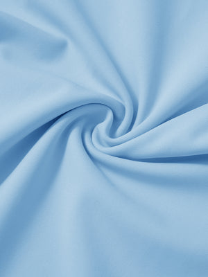 Close-up of fabric on soft lightweight casual golf pants with 5 pockets, showing texture in light blue.