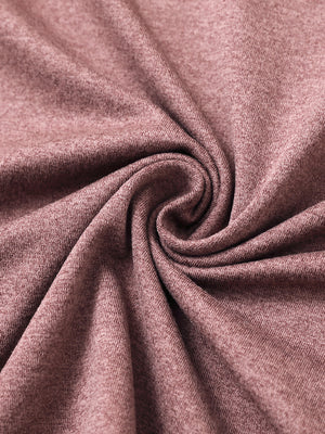 Fabric close-up of Quarter zip melange pullover with blended texture in pink heather