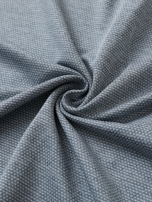 Close-up of slate green heather ventilated heather jacquard polo fabric showing breathable texture and subtle pattern details.