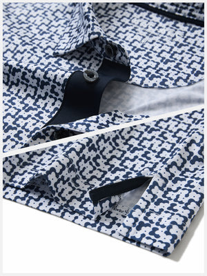Hem detail of Performance quick dry print golf polos with neat stitching and white navy clouds finish
