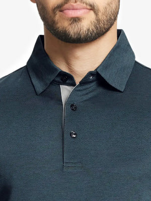 Model front close-up from nose to chest wearing Ventilated Heather Jacquard Polo in JUNGLE GREEN HEATHER