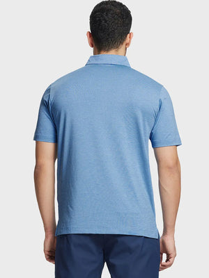Rear half-body view showing fit and jacquard pattern of Ventilated Heather Jacquard Polo – CLASSIC BLUE
