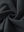 Fabric close-up of black boys stretch fleece lined casual golf pants, soft stretch fabric with warm fleece lining.