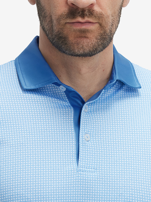 Close-up: nose to chest in light blue geo lightweight stretch upgraded print golf polo shirts