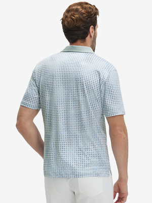 Back half-body of model in bluish abstract lightweight stretch upgraded print golf polo shirts