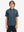 Front half-body shot of youth in navy ocean beach performance print boys golf polo, highlighting design and fit