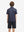 Back upper view of Stylish print boys polo shirts with clean lines and navy pink seagull tone